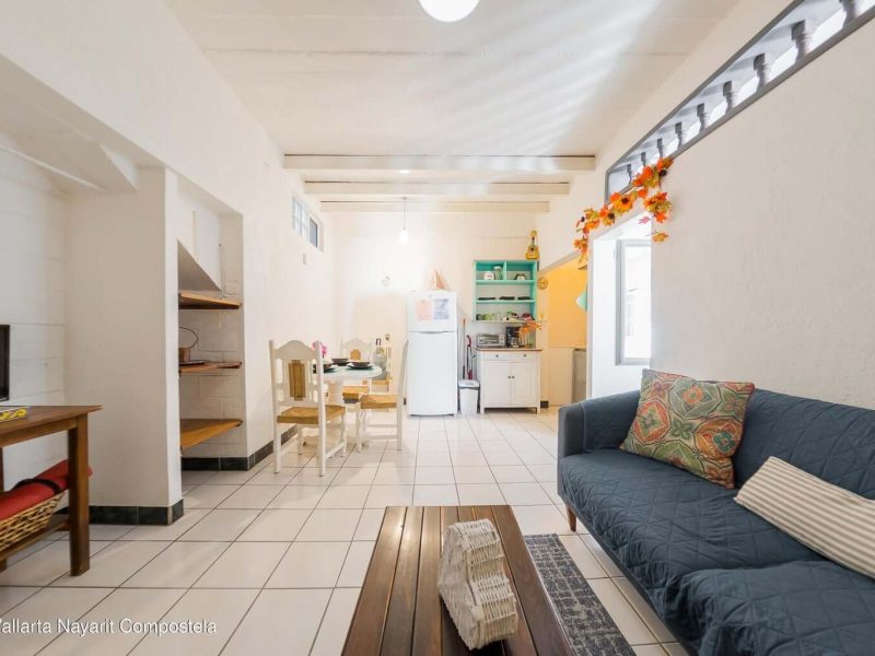 comedor y sala principal casa naranjo