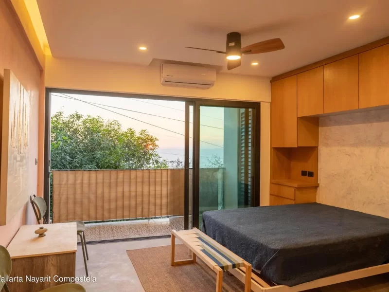 edificio-bolivia-studio-balcon-vista-mar-atardecer-06