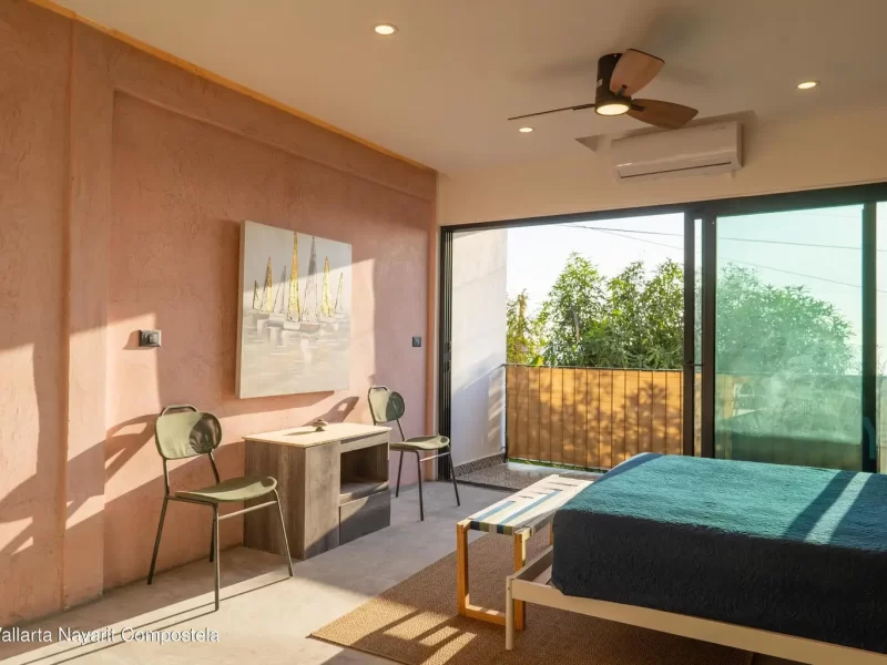 edificio-bolivia-studio-cama-murphy-pared-rosa-01